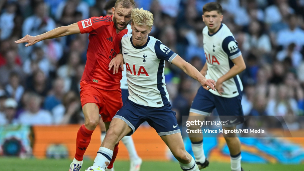 Luas Bergvall battles with Konrad Laimer of Bayern Munich during the pre-season friendly between the two teams.